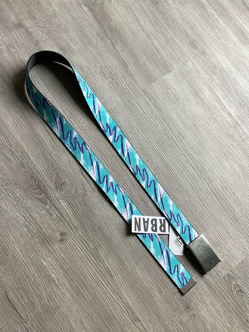 Buckle down Urban Outfitters 90’s jazz cup design belt